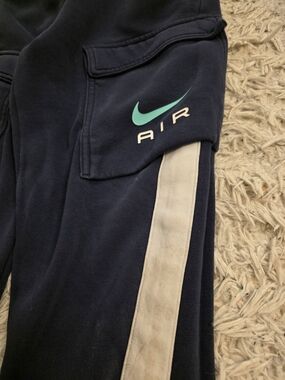 Nike Navy Joggers with Cream Side Stripe and Teal Swoosh